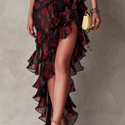 Abito Chic Nero e Rosso con Fiori e Rouches in Fondo